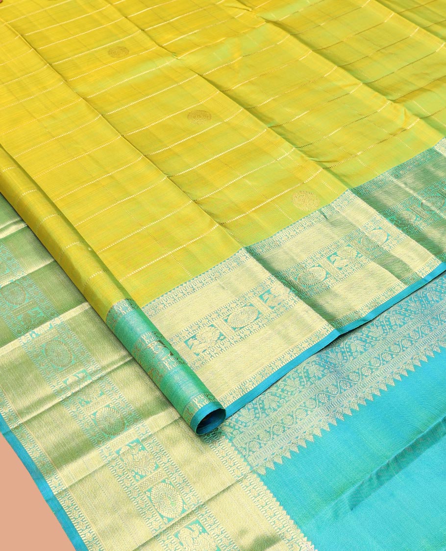 Green Kanchipuram Silk Saree, Finely Crafted with Chakra Butta Enclosed Checks, Contrast Border of Thilagam, Muthu, Rudraksham, and Mayil-Chakram Designs, Jaal Pallu, and Contrast  Blouse