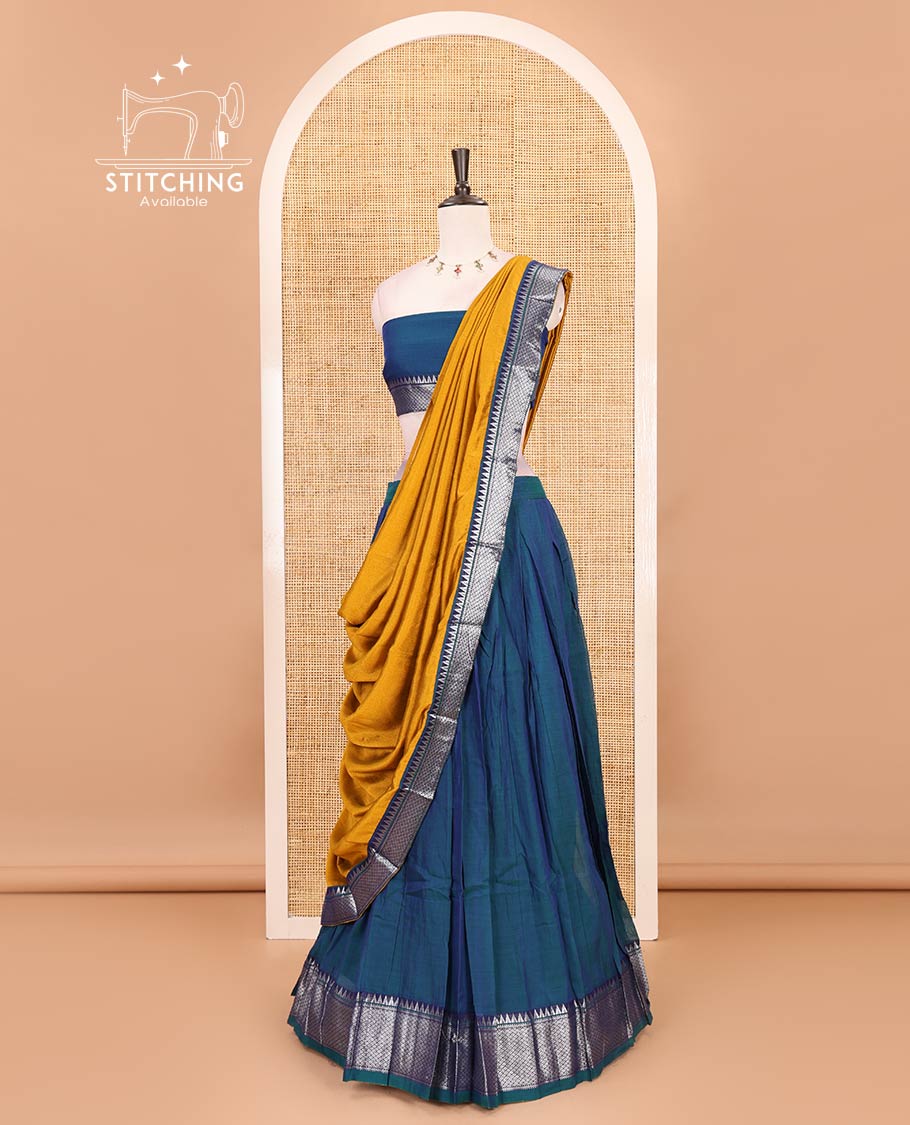 Royal blue Mercerised cotton half-saree, plain & contrast mayil kann temple border skirt, matching blouse & contrast zari border syska georgette dhavani