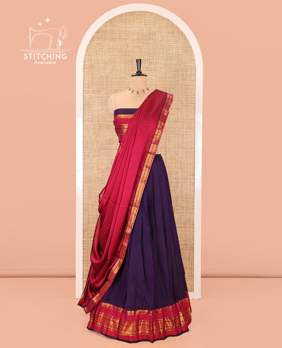 Deep Violet-Rani Pink Mercerised Cotton Half-Saree Features Plain with Contrast Traditional Zari Varisai Pettu Annam-Motif Bordered Skirt, Paired with a Matching Blouse, and Comes with a Contrast Zari-Bordered Dhavani