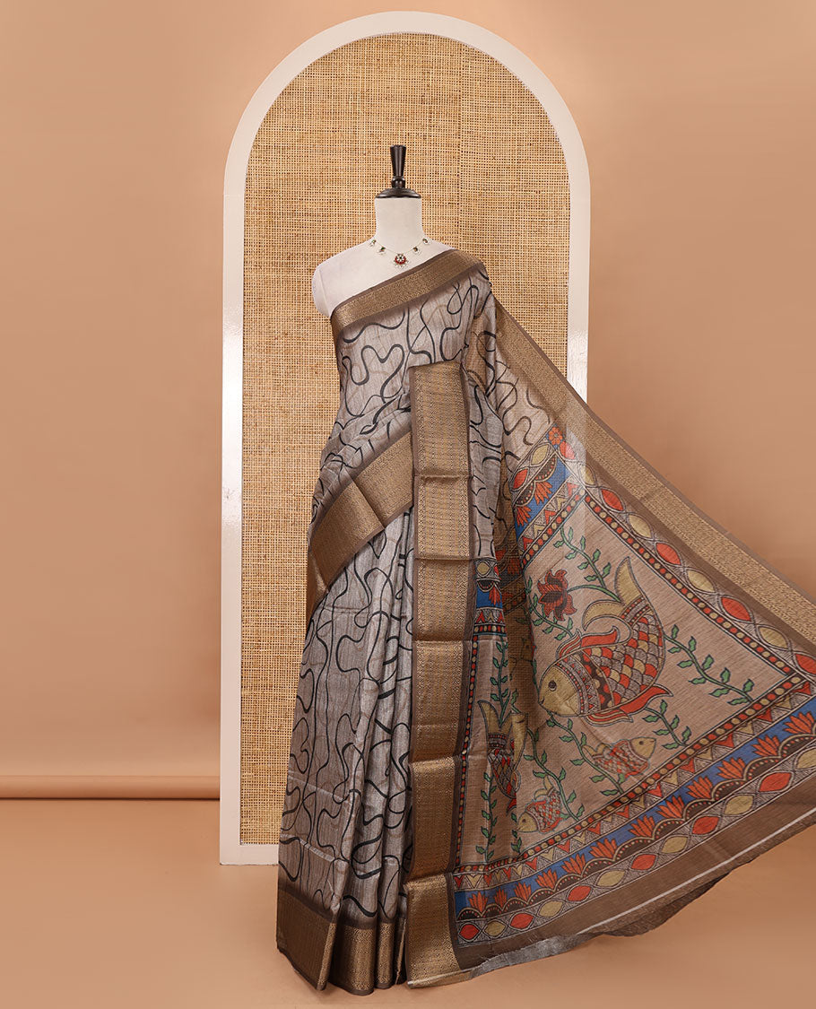 Chikku geometric printed semi-jute saree, contrast geometric zari border, Madhubani-style printed pallu, & brown blouse of print & zari work