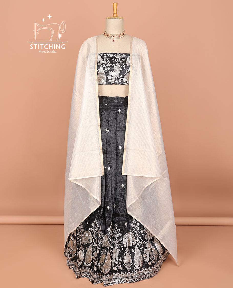 Black floral embroidered half saree with self embroidered border, floral embroidery blouse & floral buttas , scallop border dhavani