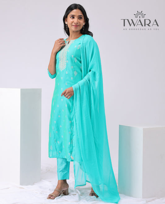 Twara light blue floral embroidered round neck, 3/4 sleeve , knee lenght straight cut kurti with straignt pants & plain dupatta
