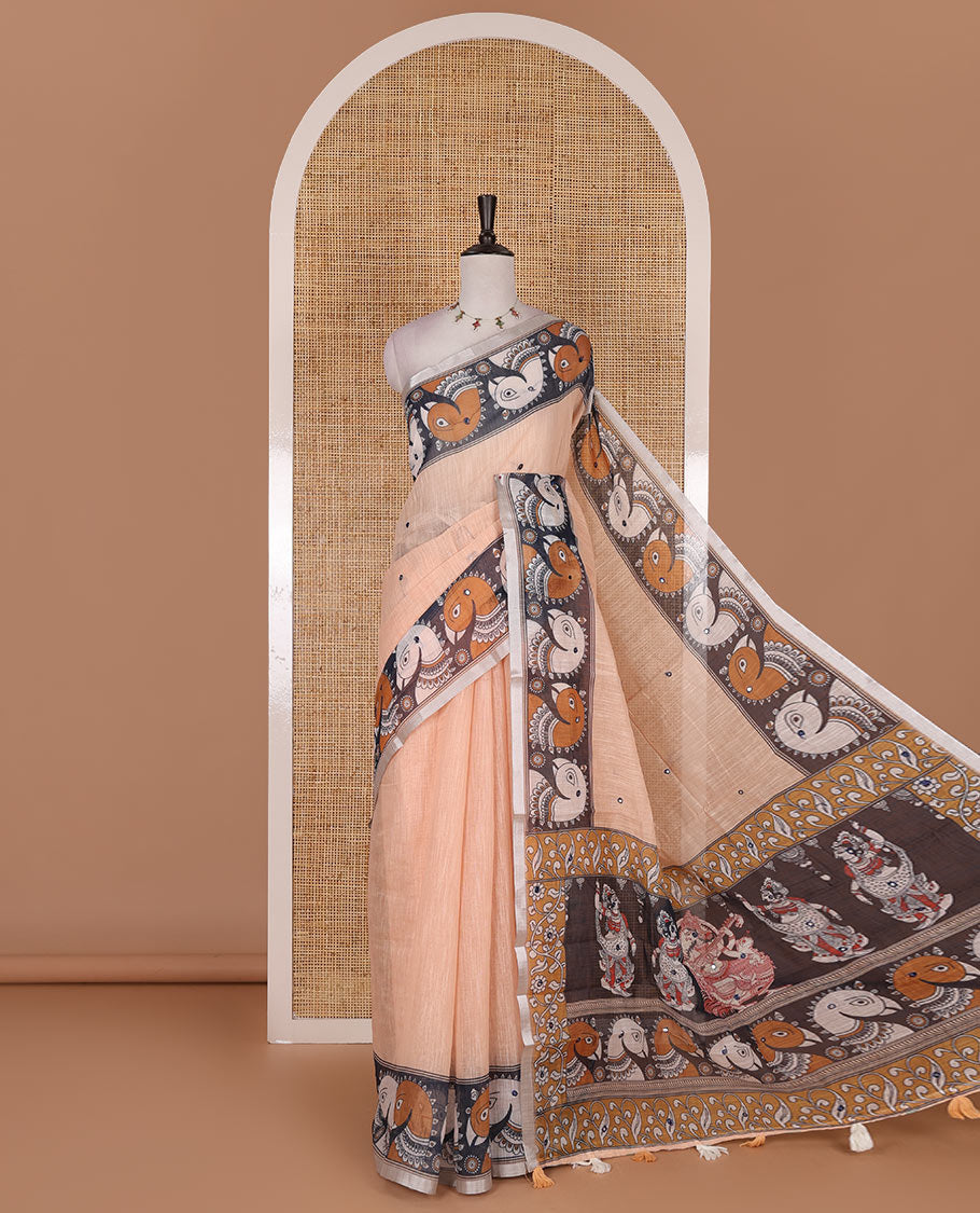Orange mirror thread embroidered linen saree, contrast kalamkari peacock printed border, pallu of kalamkari peacock and human figurines print, and printed blouse