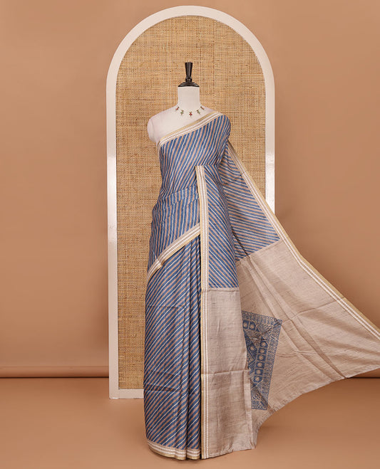 Blue lehariya-style striped semi-tussar saree, contrast resham thread triangle motifs border, diamond printed pallu & contrast printed blouse