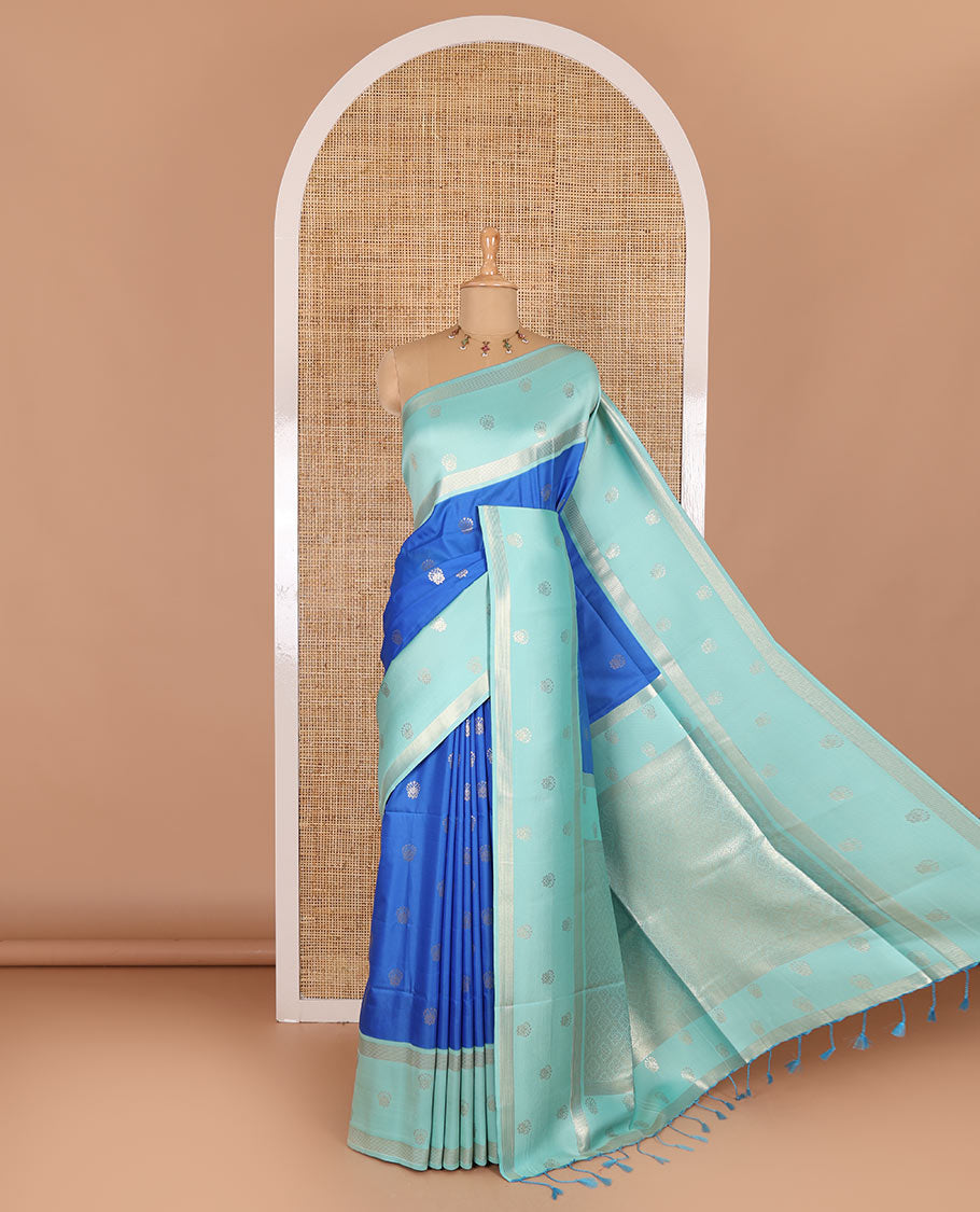 Blue zari buttas soft silk saree, contrast zari border of intricate designs, zari-rich jaal pallu, and a contrast zari design blouse
