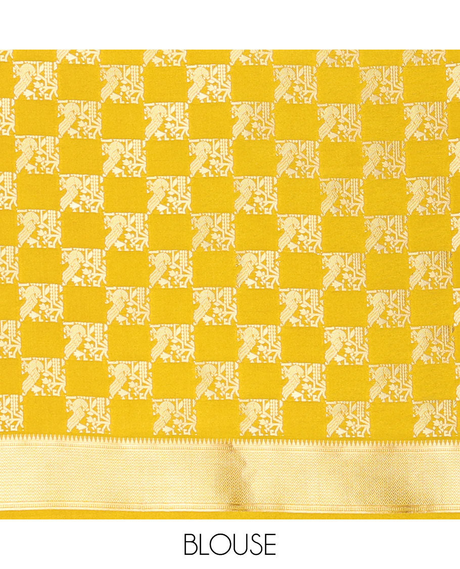 Maroon geometrical butta dola raw silk with contrast kalakshetra zari border & diamond rich pallu along with plain, peacock butta blouse