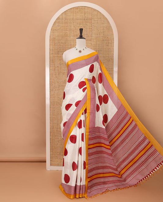 Cream polka dot printed khadi cotton saree, contrast piping border with stripes print, stripes printed pallu & yellow stripes printed blouse