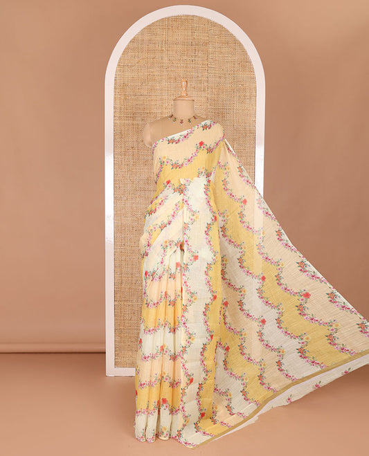 Borderless yellow rangkat style dyed and floral printed linen cotton saree with a contrast printed blouse