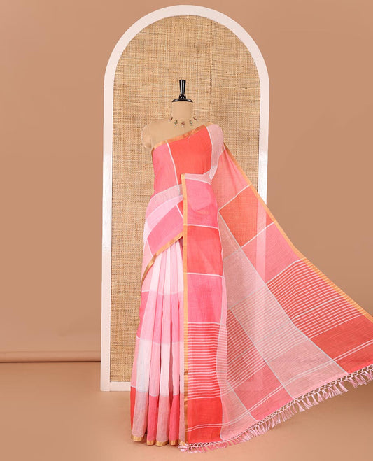 Baby pink multi-colored checked linen cotton saree, piping zari border, striped pallu, and multi-color printed blouse