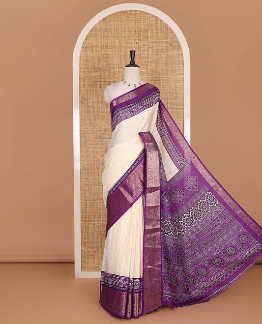 Cream-violet zari striped dola silk saree, contrast traditional zari border of leaf creeper, Ajrakh printed pallu, and Ajrakh printed blouse