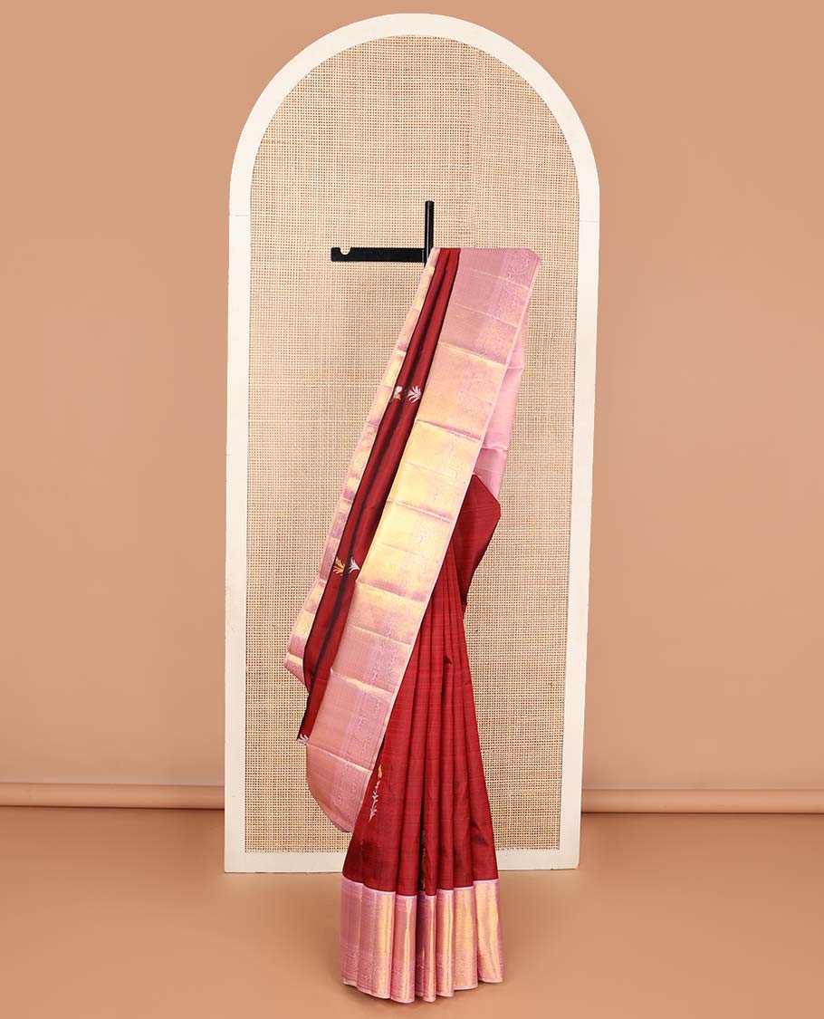Crimson red floral buttas Kanchipuram korvai silk saree, contrast neer korvai border of thilakam mokku, muthu, kathir, and kodi visiry designs, and zari woven pallu