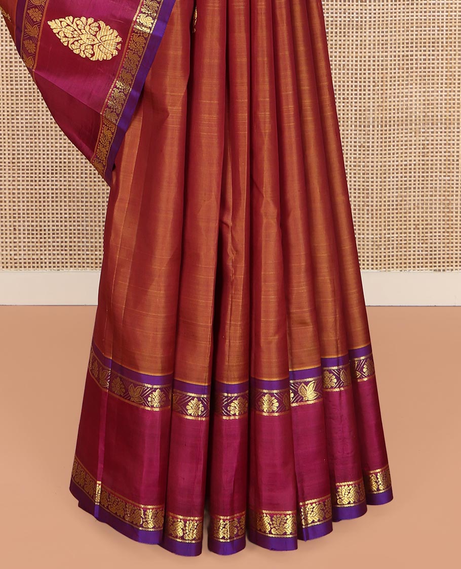 Brown Kanchipuram Silk Saree, Ornamented with Zari Buttas on Its Body, Complemented by a Contrast One-Sided Border of Floral and Peacock Designs, Pallu of Floral Zari Designs, and Comes Without a Blouse