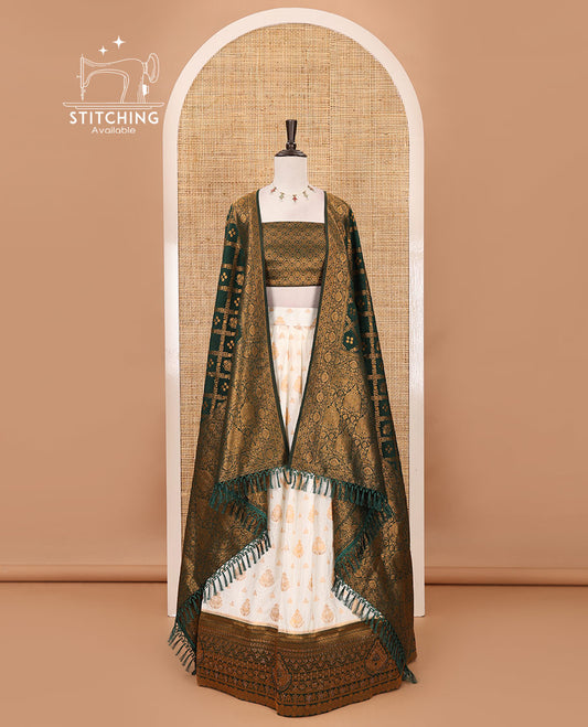 Cream georgette crepe half saree,zari buttas & traditional Swarovski stonework bottle green border skirt, jacquard blouse & banarasi jacquard dhavani
