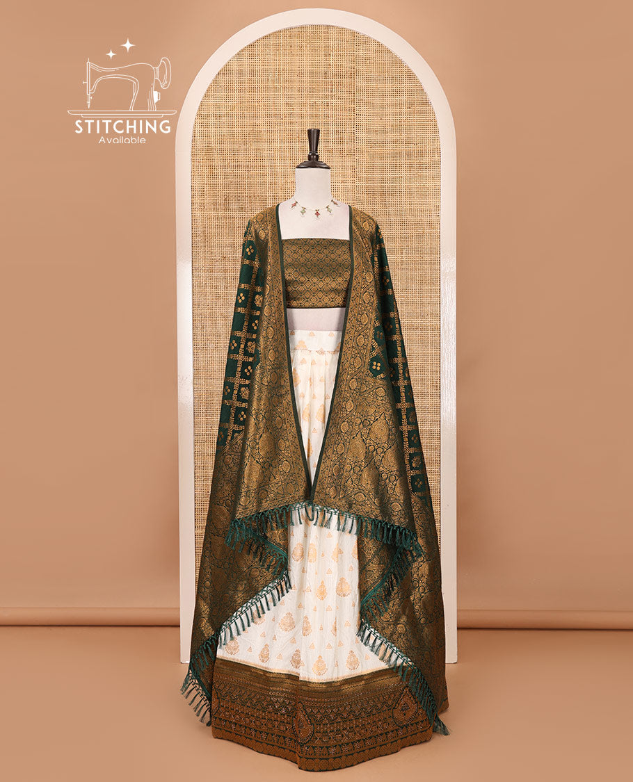 Cream georgette crepe half saree,zari buttas & traditional Swarovski stonework bottle green border skirt, jacquard blouse & banarasi jacquard dhavani
