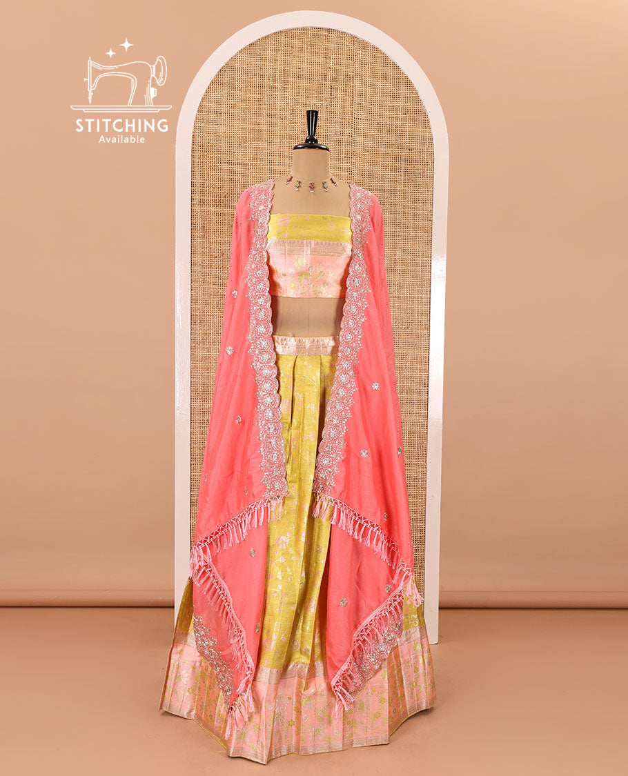 Yellow banarasi half-saree, floral jaal thread weave with contrast floral thread bordered skirt, a matching blouse, and scallop embroidered dhavani with belt