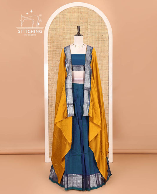 Royal blue Mercerised cotton half-saree, plain & contrast mayil kann temple border skirt, matching blouse & contrast zari border syska georgette dhavani