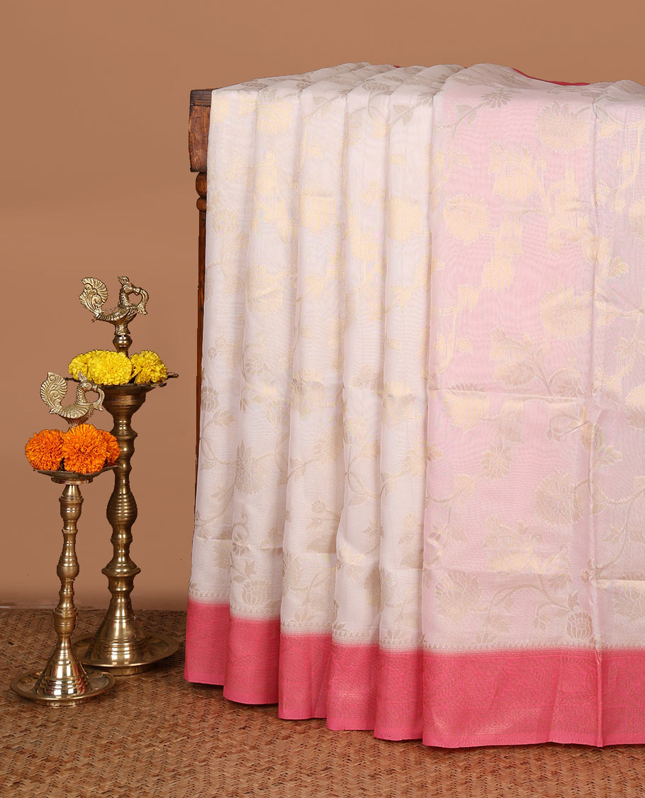 Cream with pink zari jall weaving design banaras brasso saree with contrast jacquard border & weaving pallu along with butta design blouse