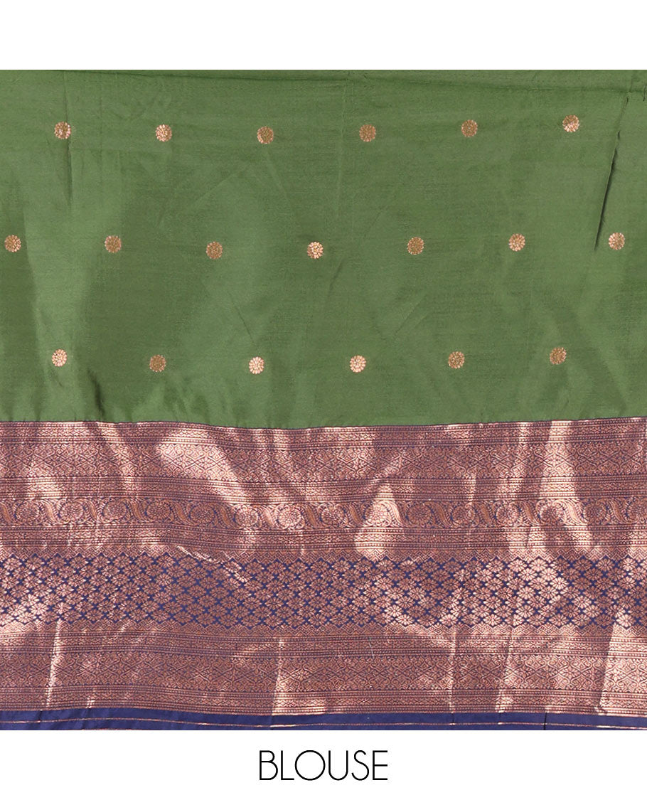 Green taffeta silk half-saree, flower zari buttas and contrast traditional zari bordered skirt, a matching blouse, and contrast embroidered satin georgette scallop dhavani