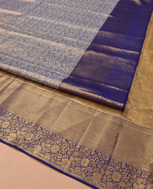 Blue Kanchipuram Tissue Silk Saree, Gracefully Embellished with Jacquard Design On Its Body, Complemented by Zari Border of Mayil Kann and Kodi Visiry Designs, Grand Jaal Pallu, and Paired with a Matching Blouse