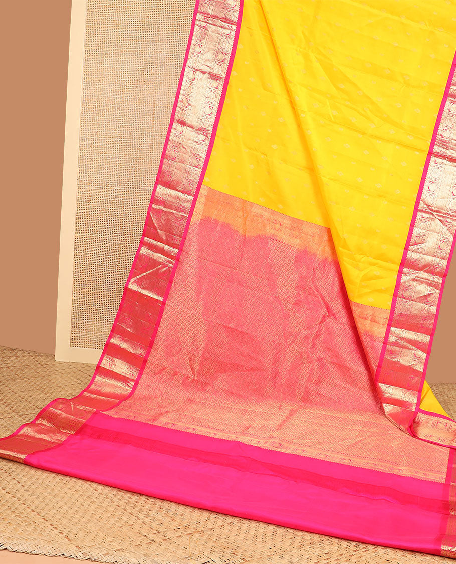 Yellow butta silk saree with contrast korvai zari design border & intricate zari design pallu