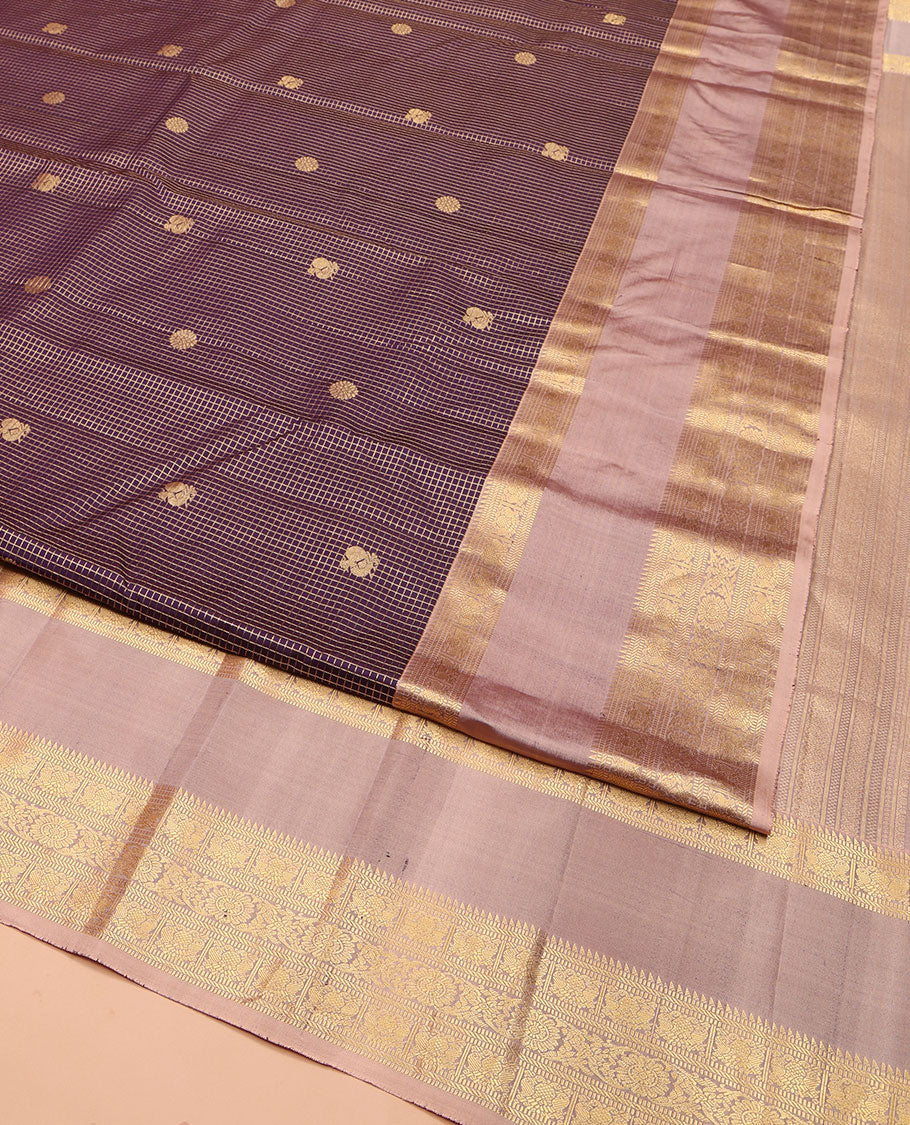 Purple Vasundhara Silk Saree, Steeped in Richness with Mayil-Chakram Buttas and Zari Checks, Complemented by a Contrast Rettai Pettu Border of Ara Bogudi, Muthu, Banaras, Iruthalai Pakshi, and Chakram Designs, Jaal Pallu, and Paired with a Contrast Blouse
