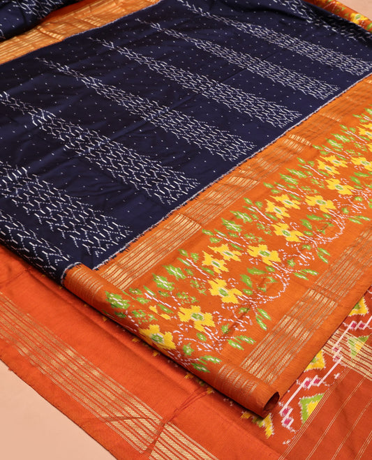 Blue Pochampally Ikat Silk Saree, Embellished with Ikkat Buttas on Its Body, Complemented by a Contrast Intricately Ikkat Woven Border, Pallu of Ikkat Weave, and Paired with a Contrast Blouse