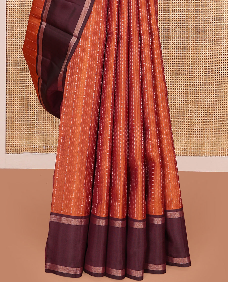 Orange zari design Kanchipuram silk saree, contrast rettai pettu zari striped border, and jaal patterned pallu
