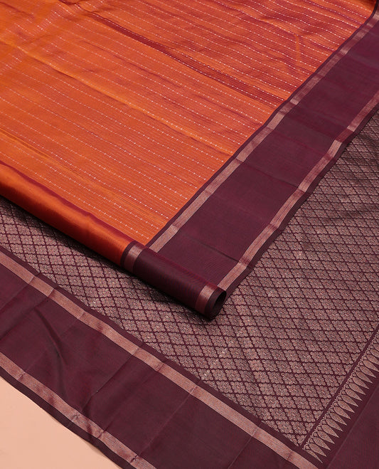 Orange zari design Kanchipuram silk saree, contrast rettai pettu zari striped border, and jaal patterned pallu