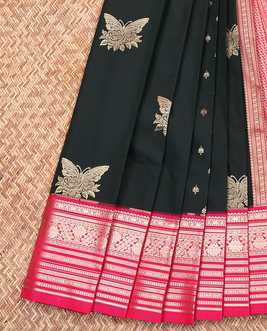 Black Budget Silk Saree, Beautified with Butterfly Buttas All Over Its Body, Complemented by a Contrast Traditional Zari Design Border, Contrast Pallu of Chevron Stripes, and Paired with a Contrast Blouse