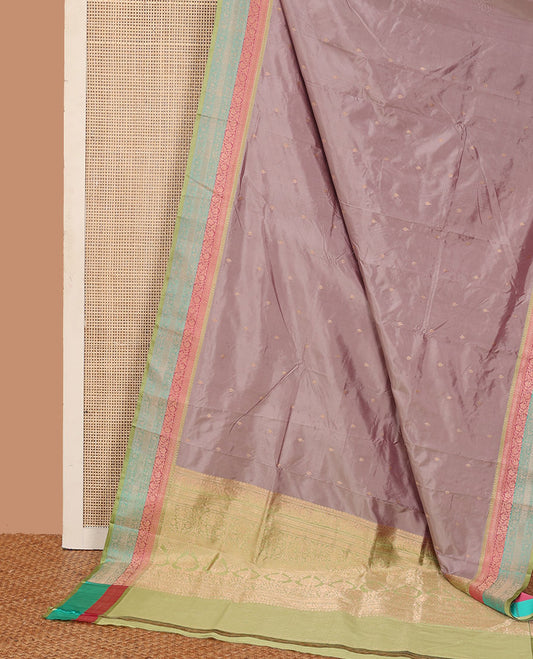 Grey zari buttas katan silk saree, contrast traditional zari border of floral creeper motifs, and Mughal style intricate patterns featured pallu