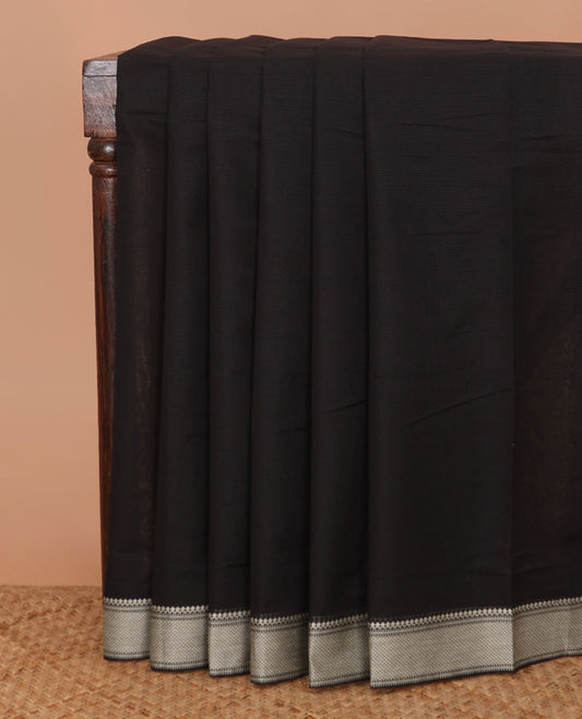 Black sparesly striped Mangalagiri Cotton saree, traditional motifs border, plain pallu, and contrast kalamkari floral printed blouse