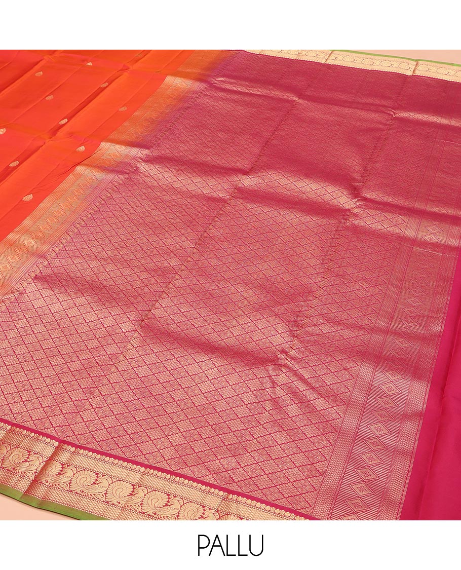 Orange Kanchipuram Silk Saree, Enthralled with Zari Buttas on Its Body, Complemented by a Contrast Border of Thilakam Mokku, Muthu, Mayil Kann, and Mayil Designs, Opulently Embellished Jaal Pallu, and Paired with a Contrast Blouse