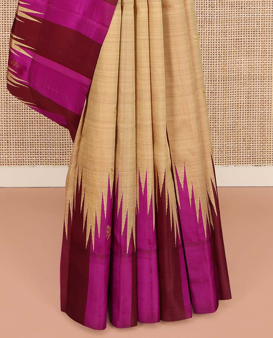 Sandal Kanchipuram Silk Saree, Elevated with Zari Buttas on Its Body, Complemented by a Contrast One-Sided Thazampoo Rekku Border of Zari Buttas, Pallu Steeped with Zari Designs, and Comes Without a Blouse