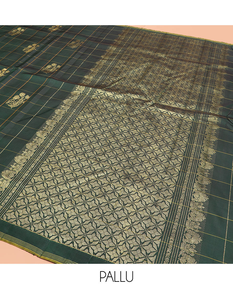 Green Kanchipuram Silk Saree Featuring Floral Zari Buttas Enclosed in Checks, Complemented by a Contrast Striped Border, a Regal Pallu Woven with Intricate Zari Designs, Paired with a Matching Blouse