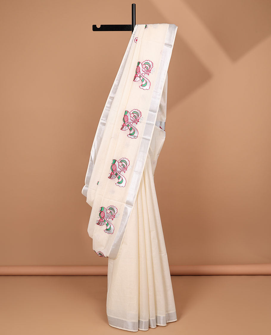 Cream peacock embroidered motifs kerala saree, plain border & pallu of peacock embroidery
