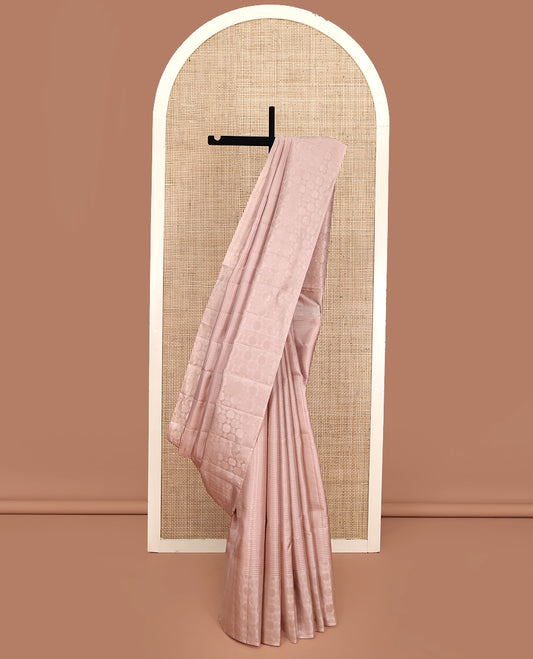 Beige Mayuri Soft Silk Saree, Subtly Sparkled With Stripes On Its Body, Sparsely Woven Border, Intricate Pallu and Paired with a Matching Blouse