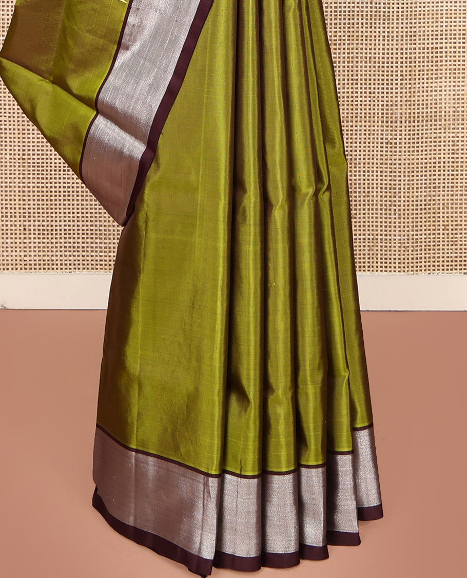 Green Venkatagiri Silk Saree, Mesmerized with Parrot Green All Over Its Body, Complemented by a Contrast Zari Border, Pallu Artfully Detailed with Rose Meenakari Designs, and Paired with a Matching Blouse