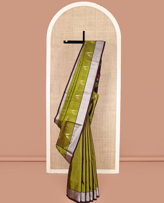 Green Venkatagiri Silk Saree, Mesmerized with Parrot Green All Over Its Body, Complemented by a Contrast Zari Border, Pallu Artfully Detailed with Rose Meenakari Designs, and Paired with a Matching Blouse