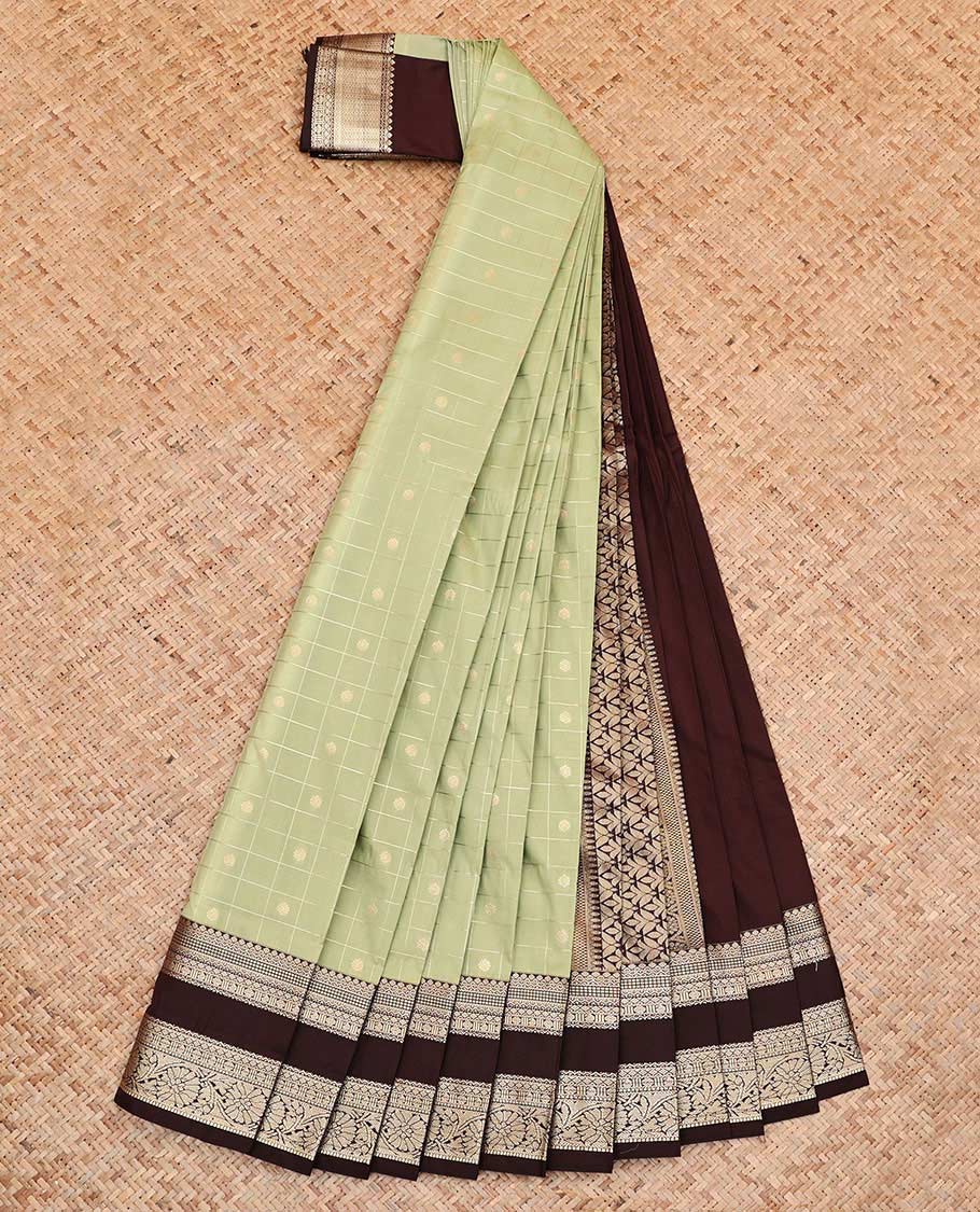 Green Budget Silk Saree, Subtly Sparkled With Zari Butta Enclosed Checks On Its Body, Complemented by Contrast Rettai Pettu Border of Traditional Zari Designs, Intricately Designed Pallu and Paired with a Contrast Blouse