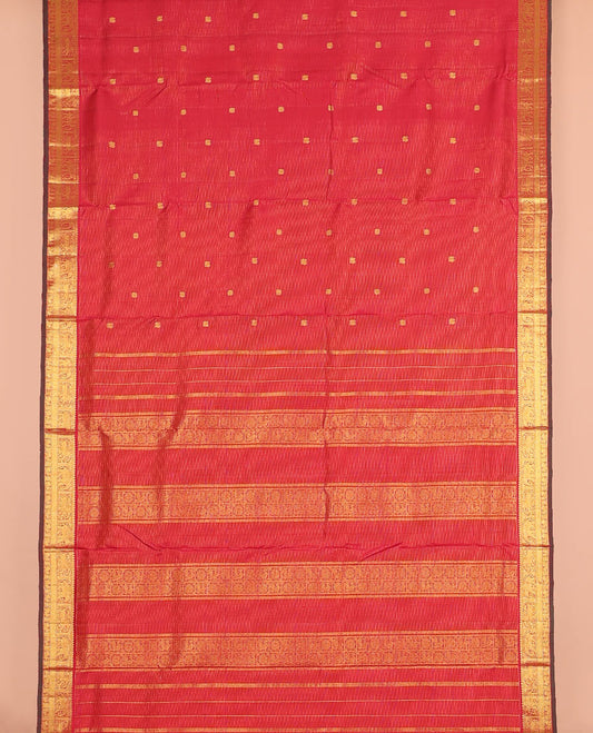 Red zari striped and mayil buttas nine-yard silk saree, zari border of thilakam mokku, muthu, yaanai, yaali, and mayil designs, and zari design pallu