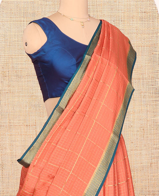 Orange Mysore Silk Saree, Gleamed Up with Zari Checked Design on Its Body, Complemented by a Contrast Traditional Zari Design Border, Sparsely Woven Pallu of Stripes, and Paired with a Contrast Blouse