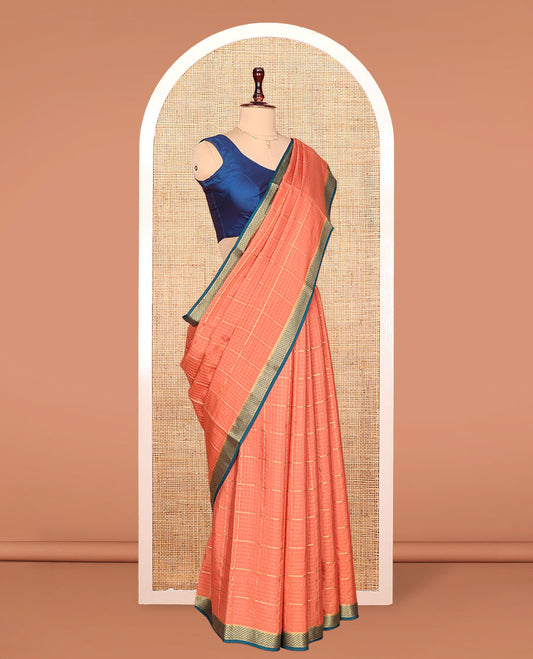 Orange Mysore Silk Saree, Gleamed Up with Zari Checked Design on Its Body, Complemented by a Contrast Traditional Zari Design Border, Sparsely Woven Pallu of Stripes, and Paired with a Contrast Blouse