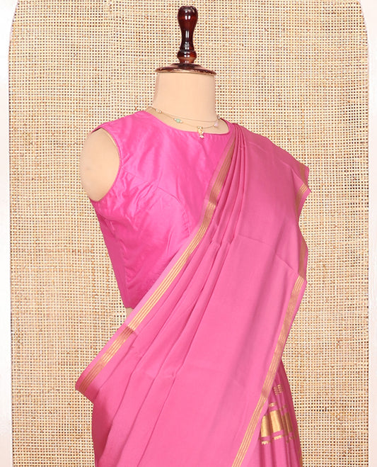 Pink Plain Mysore Silk Saree, Highlighted by Traditional Zari Border of Elephant Motifs, Subtly Zari Striped Pallu, and Paired with a Matching Blouse