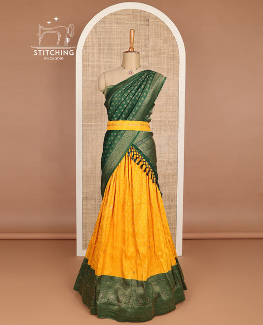 Yellow floral jacquard half saree with contrast zari design border, zari design blouse & floral zari design dhavani