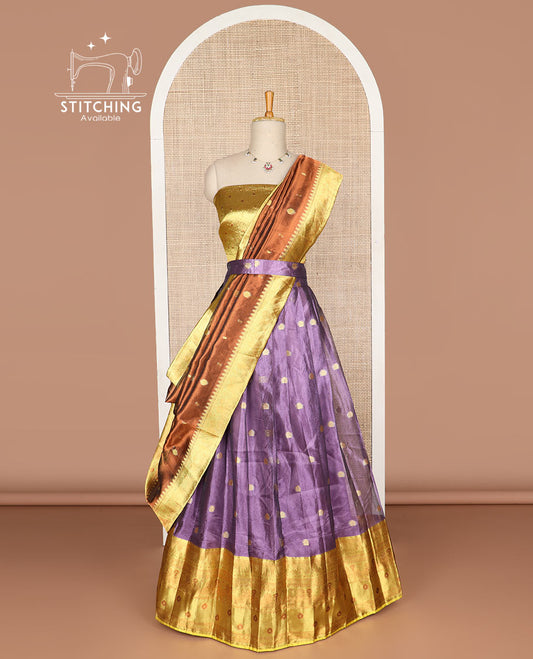 Purple buttas tissue half saree with contrast zari design border, floral design blouse & floral design dhavani