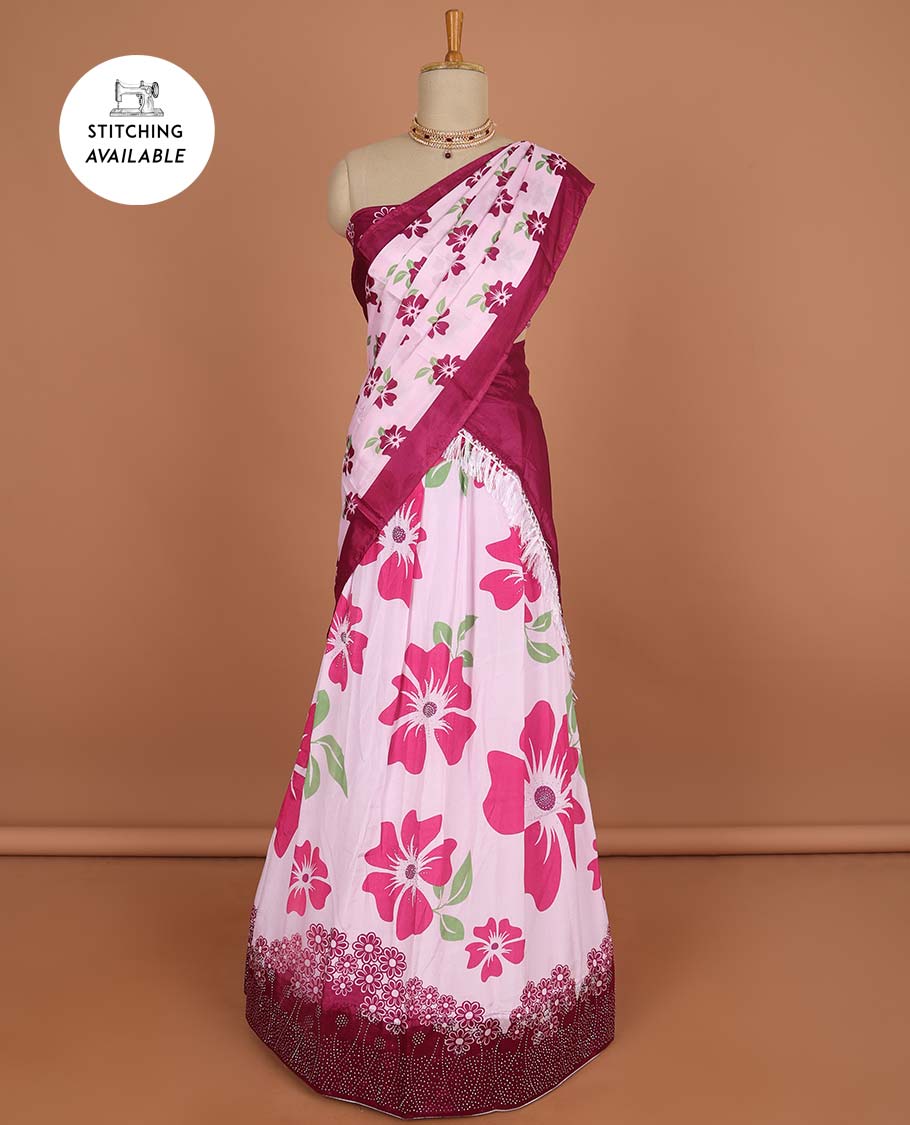 Light pink floral design half saree with contrast border, floral design blouse & floral design dhavani