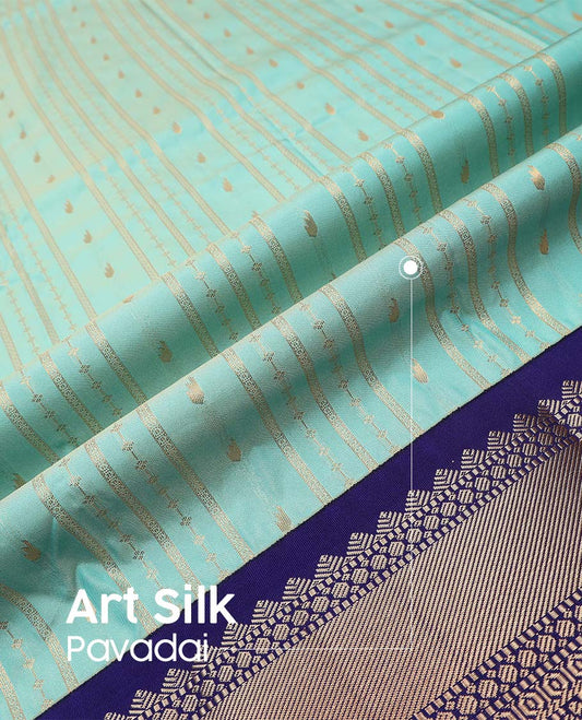 Turquoise art silk pavadai material, zari design with contrast traditional zari border skirt, and contrast blouse