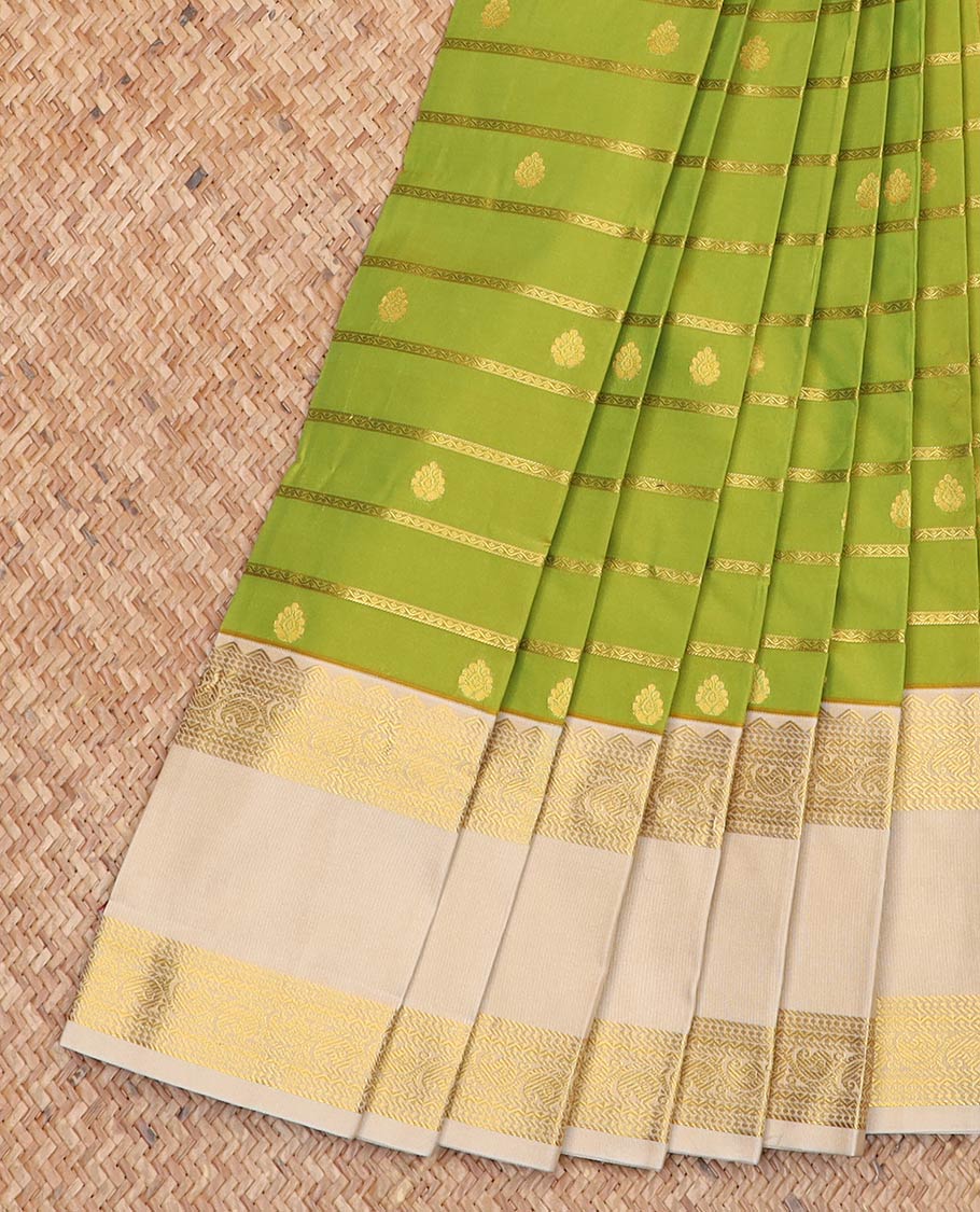Green zari buttas and striped gift saree, contrast traditional zari rettai pettu border, and jaal pallu