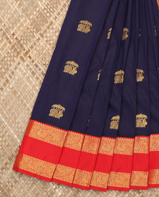 Blue Budget Silk Saree Detailed with Peacock Buttas, Complemented by a Contrast Traditional Zari-Rettai Pettu Border, Featuring a Pallu Elevated with Diagonal Stripes, and Paired with a Contrast Blouse