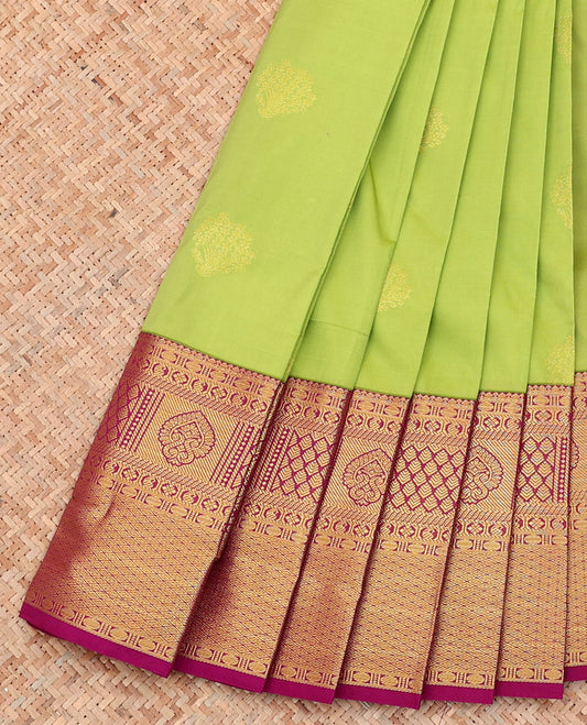 Parrot Green Budget Silk Saree, Features Zari Buttas on Its Body, Complemented by a Contrast Traditional Zari Design Border, Pallu of Floral Design, and Paired with a Contrast Blouse